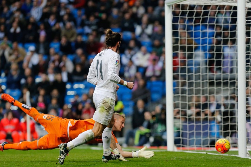 Mandatory Credit: Photo by Ruben Albarran/Shutterstock 5498584aj Real Madrid s Welsh forward Gareth Bale scoring a goal Real Madrid v Rayo Vallecano, La Liga, Football, Santiago Bernabeu, Madrid, Spai ...