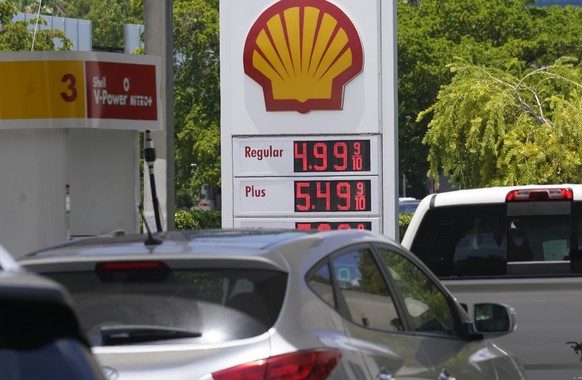 FILES - Cars line up at a Shell gas station June 17, 2022, in Miami. President Joe Biden on June 22 will call on Congress to suspend the federal gasoline and diesel taxes for three months. It&#039;s a ...