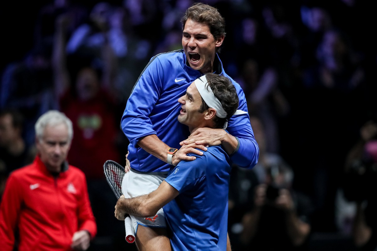 epa06224920 Switzerland's Roger Federer (down) and Spain's Rafael Nadal of the Team Europe celebrate after winning the Laver Cup tennis tournament in Prague, Czech Republic, 24 September 201 ...