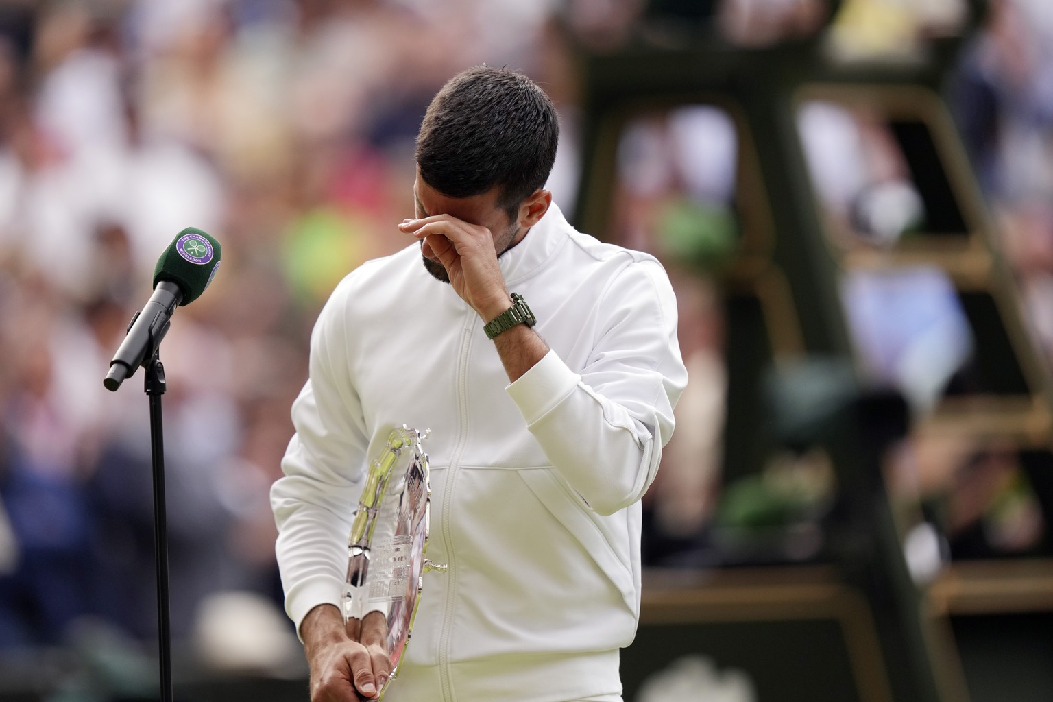 Serbia&#039;s Novak Djokovic cries after losing to Spain&#039;s Carlos Alcaraz in the men&#039;s singles final on day fourteen of the Wimbledon tennis championships in London, Sunday, July 16, 2023. ( ...