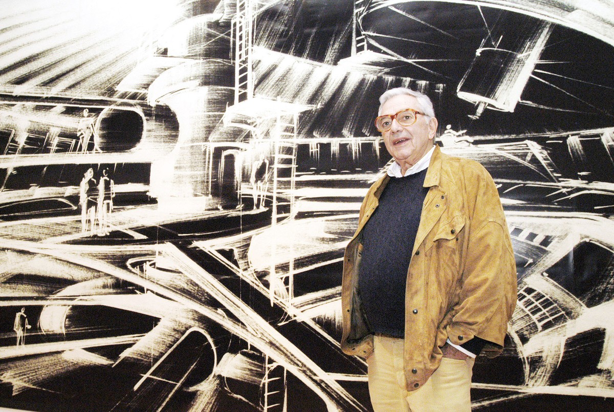 FILE - In this Oct. 31, 2002 file photo, German film designer Ken Adam stands in front of one of his futuristic designs at the exhibition "James Bond - Berlin - Hollywood" in the museum &quo ...