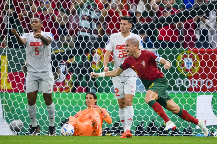 Portugal&#039;s defender Pepe, right, celebrates after scoring a goal next to Switzerland&#039;s defender Manuel Akanji, Switzerland&#039;s goalkeeper Yann Sommer and Switzerland&#039;s defender Fabia ...
