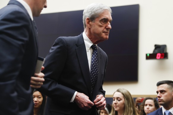 epa07737684 Former Special Counsel Robert Mueller takes a break after he testify before the House Judiciary Committee during a much-anticipated hearing about Russian interference into the 2016 electio ...