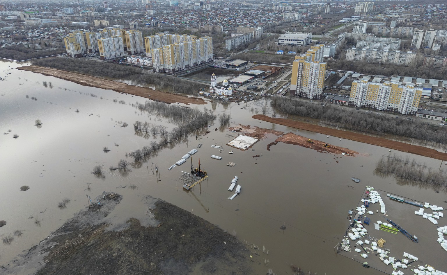 epa11273197 An aerial photo taken with a drone shows the flooded residential area of the outskirts of Orenburg, Orenburg region, Russia, 11 April 2024. The flood situation in the Orenburg region has r ...