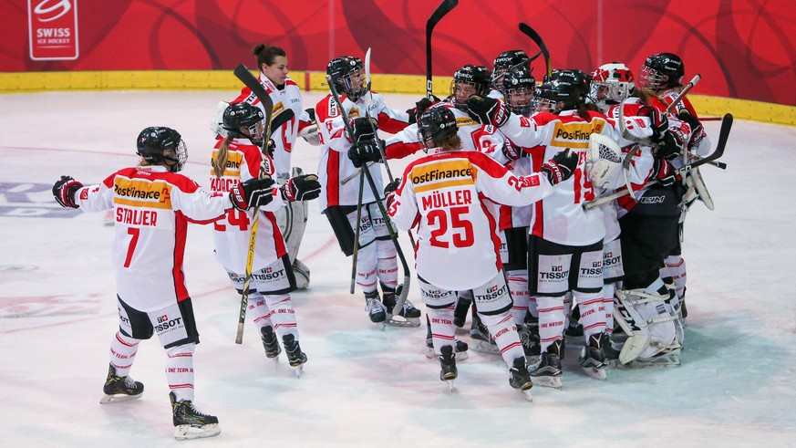 The Swiss team cheering about their 6.1 victory over Denmark after the women&#039;s ice hockey qualification game between Switzerland and Denmark at the Olympic Qualification Tournament for the 2018 P ...