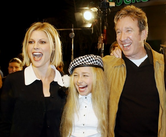 FILE - Hayden Panettiere, center, arrives with fellow cast members from the film "Joe Somebody," Julie Bowen, left, and Tim Allen to the film's premiere in the Westwood Village of Los A ...