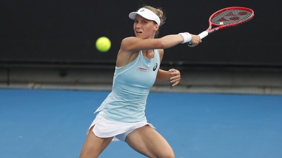 epa07285310 Viktorija Golubic of Switzerland in action against Elina Svitolina of Ukraine during their round one women&#039;s singles match at the Australian Open Grand Slam tennis tournament in Melbo ...