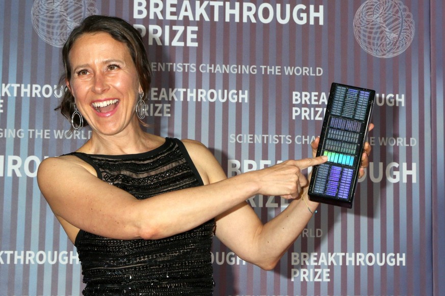 April 13, 2024, Anne Wojcicki, 23andMe, purse with DNA code detail at the 10th Annual Breakthrough Prize Ceremony at the Academy Museum of Motion Pictures on April 13, 2024 in Los Angeles, CA