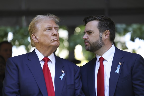 Republican presidential nominee former President Donald Trump and Republican vice presidential nominee Sen. JD Vance, R-Ohio, attend the 9/11 Memorial ceremony on the 23rd anniversary of the Sept. 11, ...