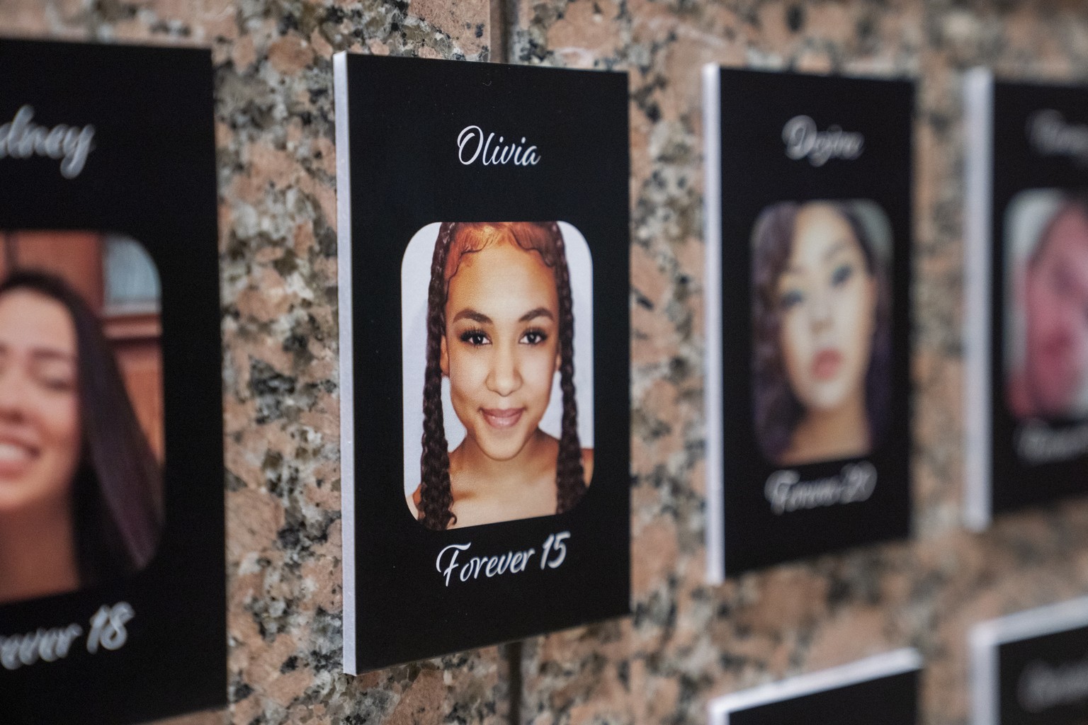 epa10210402 Thousands of pictures of Fentanyl overdose victims are displayed in the Faces of Fentanyl installation in the lobby of the DEA headquarters in Arlington, Virginia, USA, 27 August 2022. Dur ...