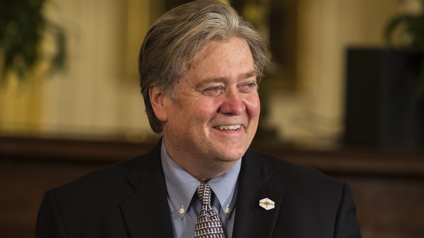 epa05755203 Chief Strategist and Senior Counselor Stephen Bannon enters a joint press conference with US President Donald J. Trump and British Prime Minister Theresa May in the East Room of the White  ...