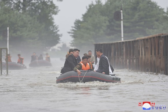 In this photo provided by the North Korean government, North Korean leader Kim Jong Un inspects a flood-hit area in Sinuiju city, North Phyongan province, North Korea Monday, July 29, 2024. Independen ...