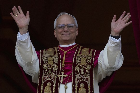 Newly elected Pope Leo XIV appears at the balcony of St. Peter&#039;s Basilica at the Vatican, Thursday, May 8, 2025. (AP Photo/Andrew Medichini)
APTOPIX Vatican Conclave New Pope