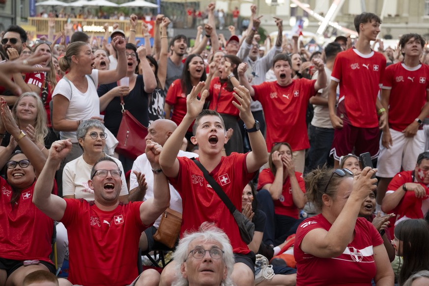 Supporters and Fans from Switzerland reacts at the Fan Zone and public viewing on Bundesplatz Square at the UEFA Women&#039;s EURO 2025 quaterfinal soccer match between Switzerland and Spain in Bern,  ...