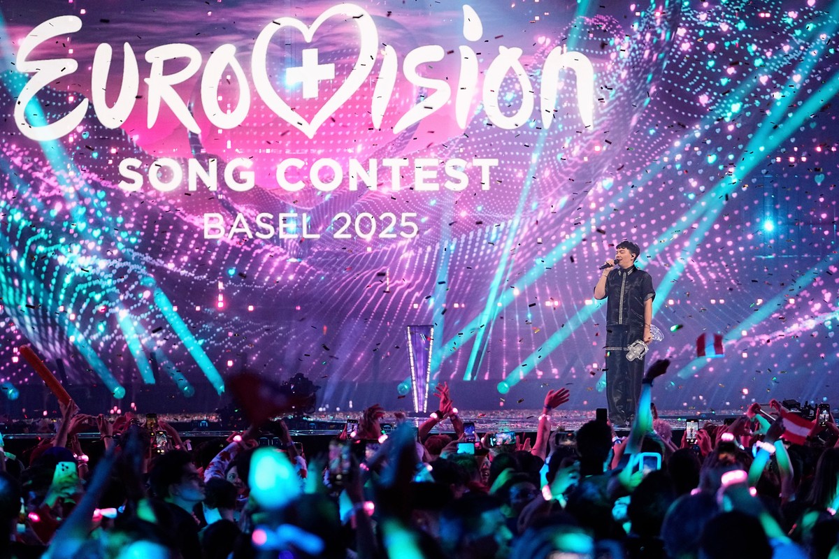 FILE - JJ from Austria stands on the stage with the trophy after winning the Grand Final of the 69th Eurovision Song Contest, in Basel, Switzerland, May 18, 2025. (AP Photo/Martin Meissner, File)
Euro ...