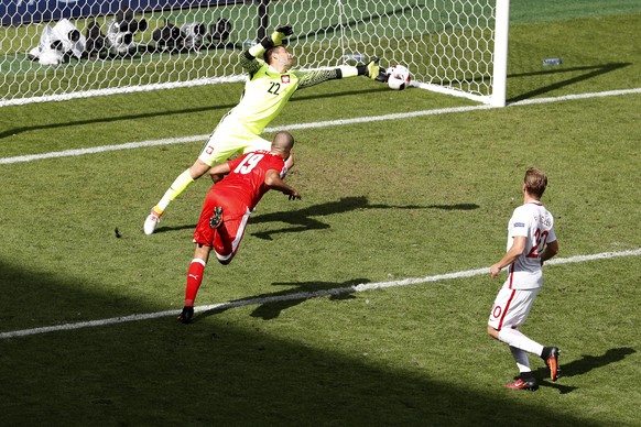 Football Soccer - Switzerland v Poland - EURO 2016 - Round of 16 - Stade Geoffroy-Guichard, Saint-Ãtienne, France - 25/6/16
Switzerland&#039;s Eren Derdiyok shoots at goal as Poland&#039;s Lukasz Fa ...