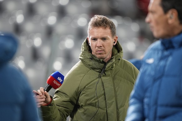 Bayern&#039;s head coach Julian Nagelsmann speaks to a tv station ahead of the German Bundesliga soccer match between Bayern Munich and Arminia Bielefeld, in Munich, Saturday, Nov. 27, 2021. (AP Photo ...