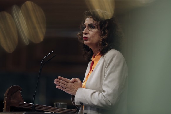 epa09828406 Spanish Treasuty minister Maria Jesus Montero speaks during the Government control session held at the Lower Chamber of Spanish Parliament in Madrid, Spain, 16 March 2022. EPA/JAVIER LIZON