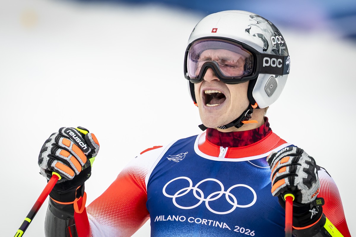 Switzerland's Marco Odermatt reacts in the finish area during the men's alpine skiing second run of the giant slalom race at the 2026 Olympic Winter Games at the Stelvio Ski centre in Bormio ...