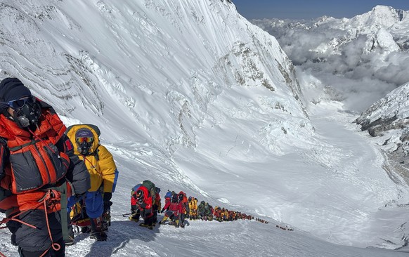 Mountaineers queue up below Camp 4 on the way to the summit of Mount Everest in Nepal, May 17, 2025. (AP Photo/Jenjen Lama)
Nepal Everest Photo Gallery