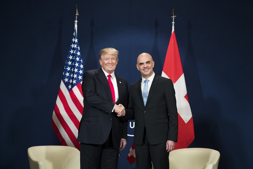 QUALITY REPEAT: Swiss Federal President Alain Berset, right, and US President Donald J. Trump, left, shake hands during a bilateral meeting during the 48th Annual Meeting of the World Economic Forum,  ...