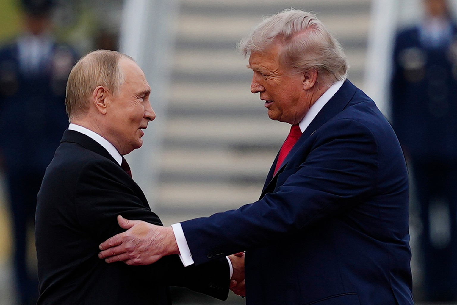 FILE - U.S. President Donald Trump greets Russian President Vladimir Putin, Aug. 15, 2025, at Joint Base Elmendorf-Richardson, Alaska. (AP Photo/Julia Demaree Nikhinson, File)
Vladimir Putin,Donald Tr ...