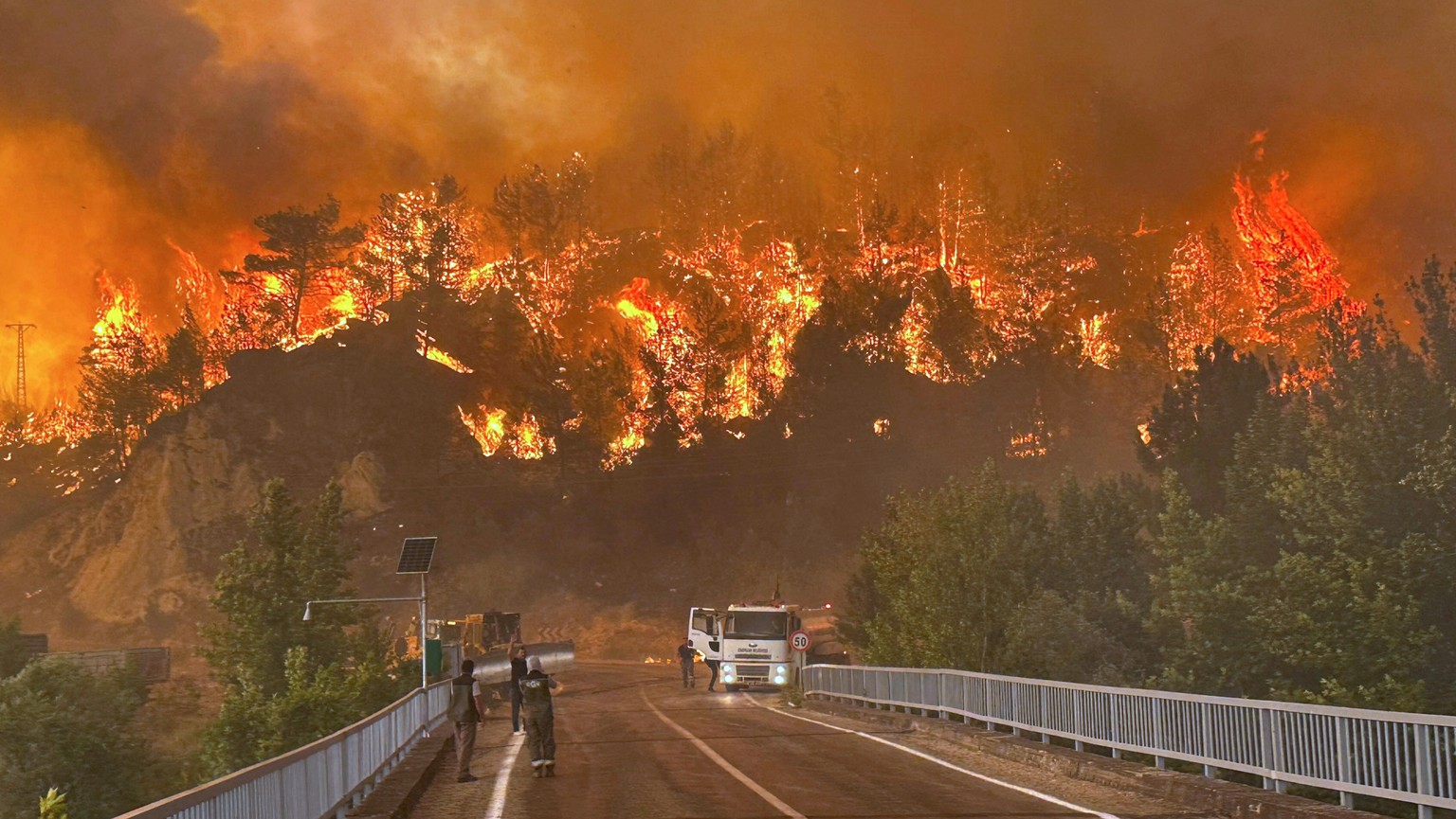 A wildfire rages across a forested area near Cavuslar village, in Karabuk district, northwest Turkey, Wednesday, July 23, 2025. (Ridvan Bostanci/IHA via AP)
Turkey Wildfire