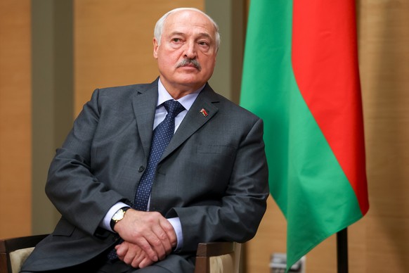 Belarusian President Alexander Lukashenko listens to Russian President Vladimir Putin during their meeting at the Novo-Ogaryovo residence outside Moscow, Saturday, Aug. 29, 2026. (Vyacheslav Prokofyev ...