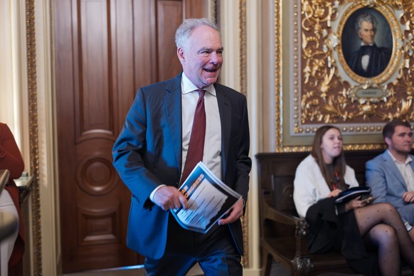 Sen. Tim Kaine, D-Va., leaves a meeting room where he and other Senate Democrats at the Capitol are looking for a solution to the spending impasse, in Washington, Thursday, Nov. 6, 2025, day 37 of the ...