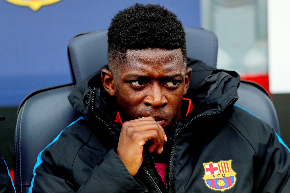 epa06515517 Barcelona's Ousmane Dembele sits on the bench before the Spanish Primera Division soccer match between FC Barcelona and Getafe CF at Camp Nou in Barcelona, Spain, 11 February 2018. EP ...