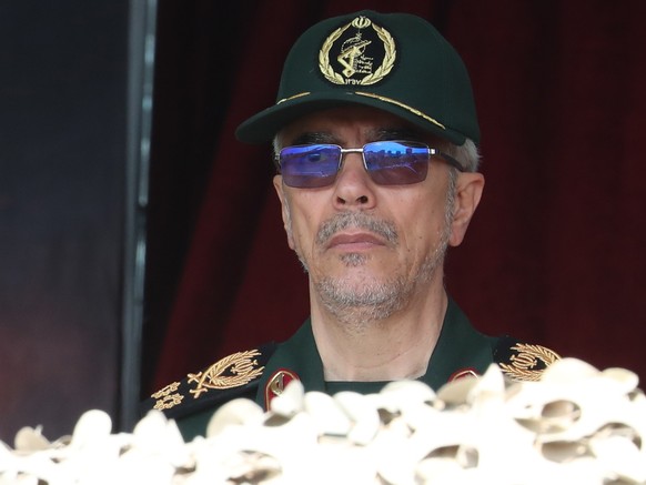 epaselect epa12172892 (FILE) - Iranian Armed Forces Chief of Staff General Mohammad Bagheri (R) and Chief Commander of the Islamic Revolutionary Guard Corps (IRGC) Major General Hossein Salami (L) att ...