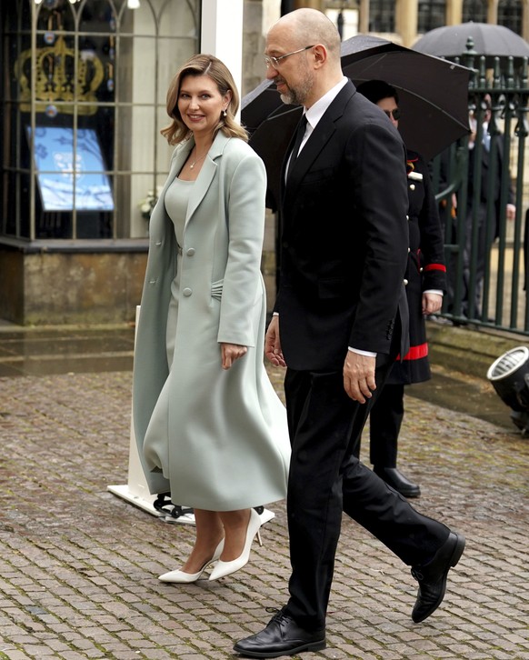 Ukraine&#039;s first lady Olena Zelenska and the Prime Minister of Ukraine, Denys Shmyhal, right arrive at Westminster Abbey ahead of the coronation of King Charles III and Camilla, the Queen Consort, ...