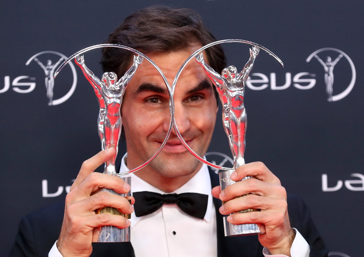 epa06569205 Swiss tennis player Roger Federer poses with the 'Sportsman Award' and 'Comeback Awards' at the 2018 Laureus World Sports Awards in Monaco, 27 February 2018. The annual ...