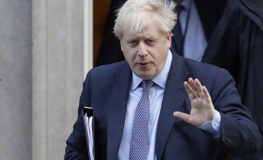 British Prime Minister Boris Johnson leaves 10 Downing Street, to go to the Houses of Parliament in London, Saturday, Oct. 19, 2019. Britain&#039;s Parliament is set to vote in a rare Saturday sitting ...