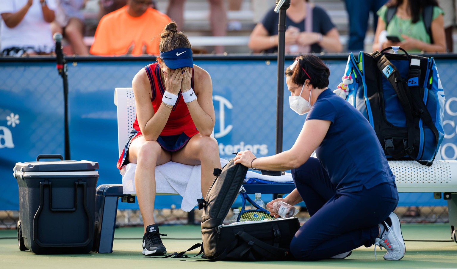 October 1, 2021, CHICAGO, UNITED STATES: Belinda Bencic of Switzerland hugs Elena Rybakina after being forced to retire with injury from her quarter-final at the 2021 Chicago Fall Tennis Classic WTA,  ...