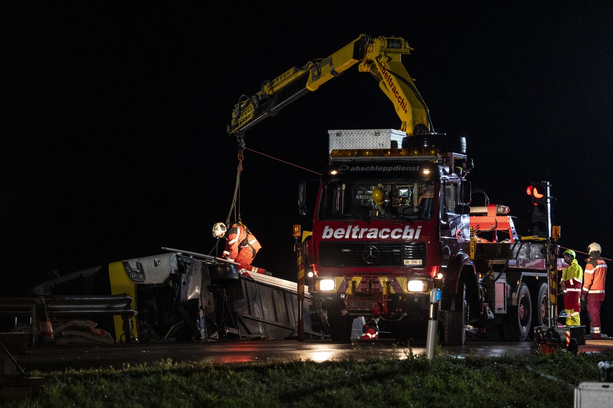 epa13230158 Emergency responders work at the scene of an accident involving a Dutch travel coach near Susch in the canton of Grisons, Switzerland, 11 September 2026. Several people died and others wer ...