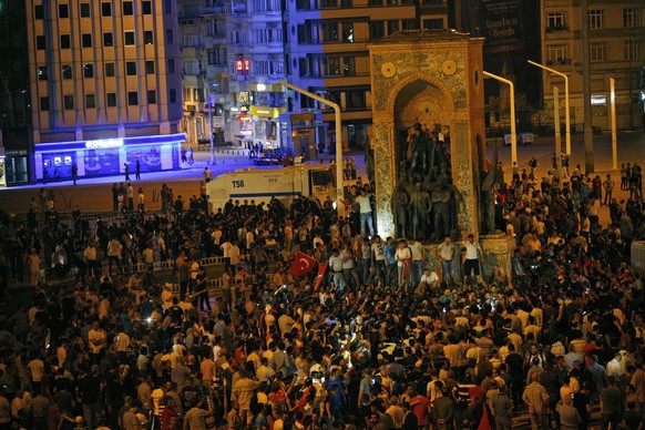 Supporters of Turkey&#039;s President Recep Tayyip Erdogan, protest in Istanbul&#039;s Taksim square, early Saturday, July 16, 2016. President Erdogan told the nation Saturday that his government was  ...