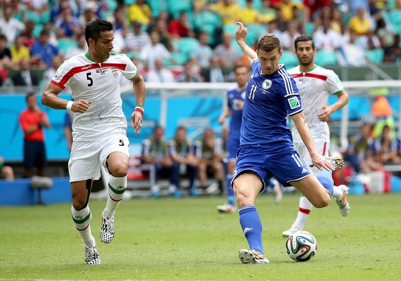epa04280604 Edin Dzeko of Bosnia-Herzegovina (C) scores the 1-0 during the FIFA World Cup 2014 group F preliminary round match between Bosnia and Herzegovina and Iran at the Arena Fonte Nova in Salvad ...