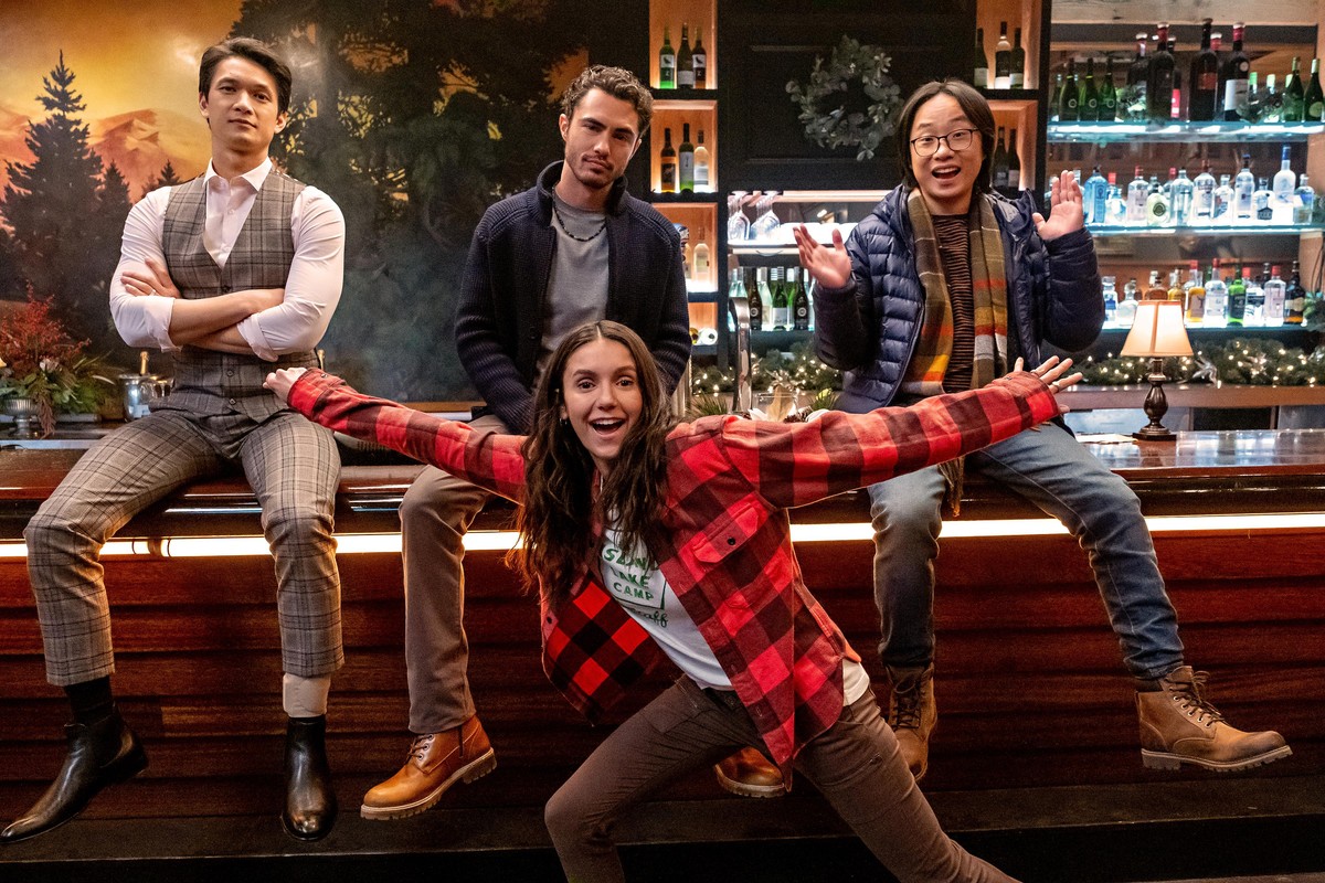Love Hard. (L to R) Harry Shum Jr. as Owen Lin, Darren Barnet as Tag, Nina Dobrev as Natalie Bauer and Jimmy O. Yang as Josh Lin in Love Hard. Cr. Bettina Strauss/Netflix © 2021
