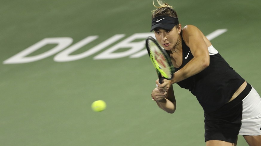 Switzerland&#039;s Belinda Bencic returns the ball to Czech Republic&#039;s Petra Kvitova during their final match of the Dubai Duty Free Tennis Championship in Dubai, United Arab Emirates, Saturday,  ...