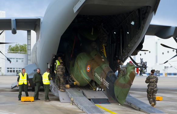 In this photo provided on Saturday Sept. 9, 2017 by the French Defence Ministry, French military transport planes and helicopters on the tarmac at Orleans, France, before heading off to Guadeloupe. Fr ...