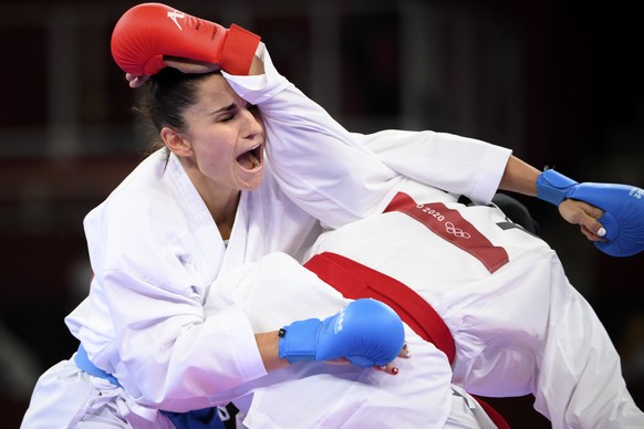 Elena Quirici, left, of Switzerland competes in the women&#039;s karate kumite +61kg fight against Feryal Abdelaziz of Egypt at the 2020 Tokyo Summer Olympics in Tokyo, Japan, on Saturday, August 07,  ...