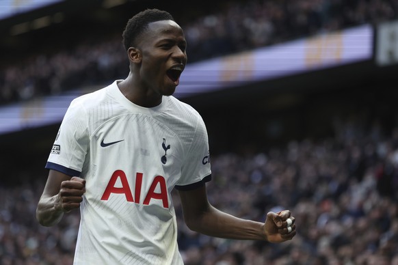 Tottenham&#039;s Pape Matar Sarr celebrates after scoring his side&#039;s opening goal during the English Premier League soccer match between Tottenham Hotspur and AFC Bournemouth at the Tottenham Hot ...