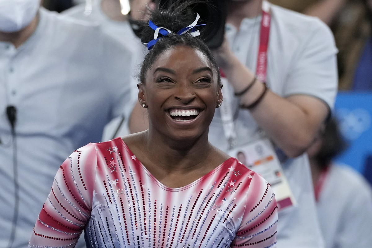 Simone Biles, of the United States, after performing on the balance beam during the artistic gymnastics women's apparatus final at the 2020 Summer Olympics, Tuesday, Aug. 3, 2021, in Tokyo, Japan ...