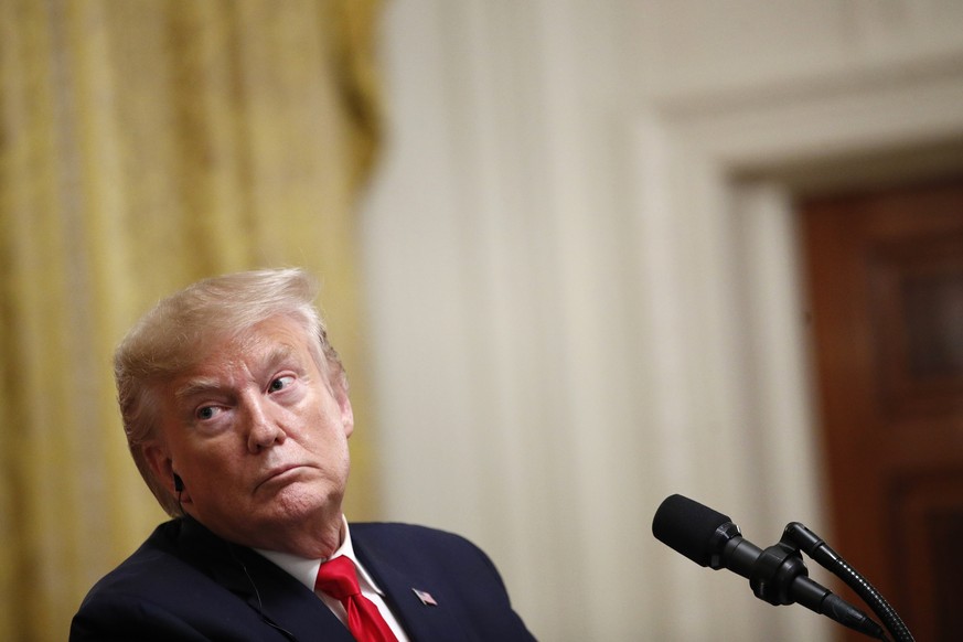 President Donald Trump listens during a news conference with Turkish President Recep Tayyip Erdogan in the East Room of the White House, Wednesday, Nov. 13, 2019, in Washington. (AP Photo/Patrick Sema ...