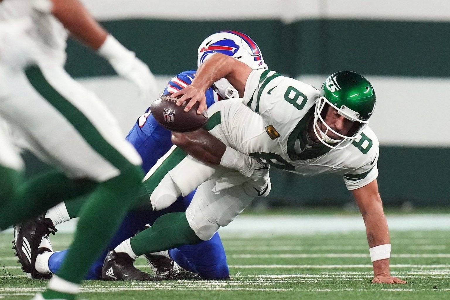 Syndication: The Record Buffalo Bills defensive end Leonard Floyd 56 sacks New York Jets quarterback Aaron Rodgers 8 early in the first quarter during the home opener at MetLife Stadium on Monday, Sep ...