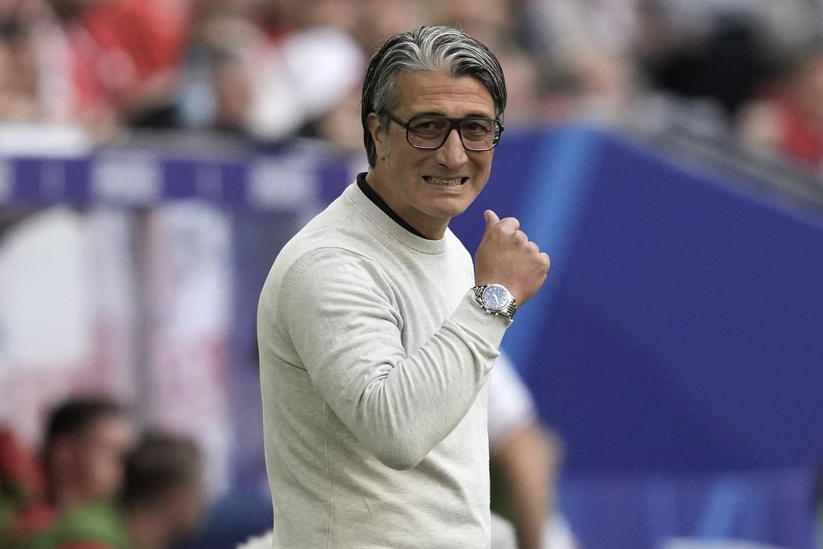 Switzerland's head coach Murat Yakin reacts during a quarterfinal match between England and Switzerland at the Euro 2024 soccer tournament in Duesseldorf, Germany, Saturday, July 6, 2024. (AP Pho ...