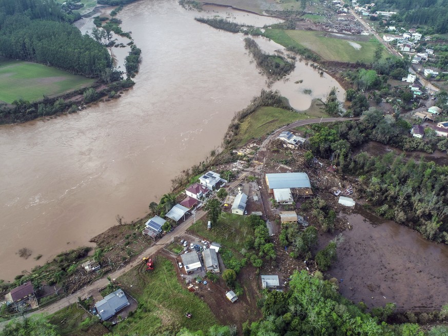 The Taquari River water level is high due to a deadly cyclone in Mucum, Rio Grande do Sul state, Brazil, Wednesday, Sept. 6, 2023. An extratropical cyclone in southern Brazil caused floods in several  ...