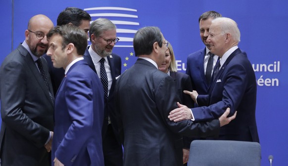 epa09847337 US President Joe Biden is welcomed by European leaders at the start of European Council Summit in Brussels, Belgium, 24 March 2022. The European Council summit starts with the participatio ...