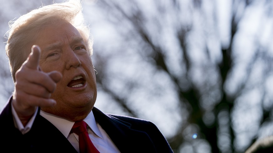 President Donald Trump speaks to reporters before boarding Marine One on the South Lawn of the White House in Washington, Tuesday, March 13, 2018, to travel to Andrews Air Force Base, Md. Trump fired  ...